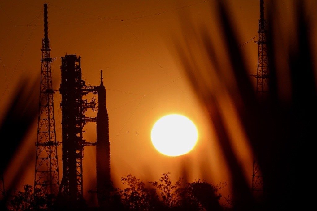 NASA's SLS rocket with the Lockheed Martin-built Orion spacecraft rolls back to the vehicle assembly building at the Kennedy Space Center